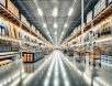 High-resolution photograph of a brightly lit home improvement store with wide aisles, neatly organized tools, lumber, paint cans, and hardware, creating a sharp and clean shopping environment.