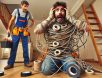 A baffled electrician holding a bundle of wires wrapped in an absurd amount of electrical tape, reacting to an over-the-top DIY repair in a residential home.